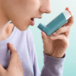 Pulmonology Asthma Allergy Centre Thrissur Representative Photo of Inhaler use